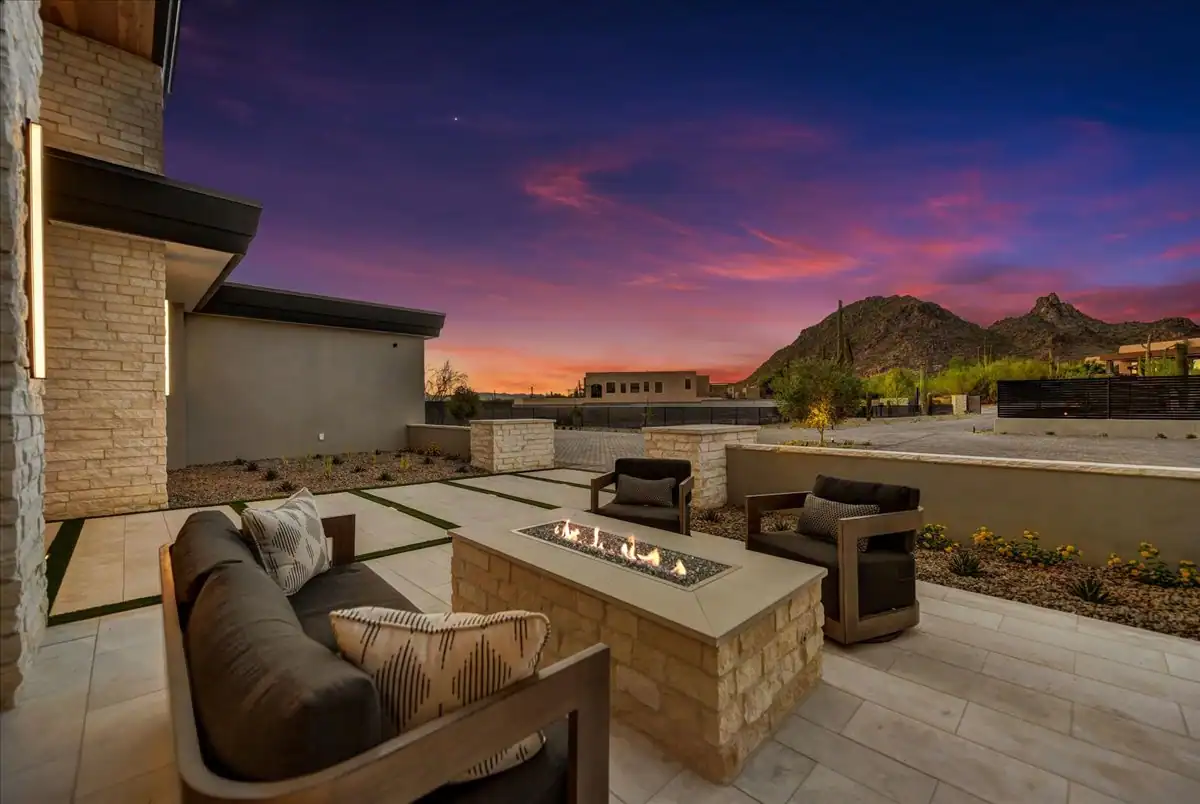 Twilight view across the firepit