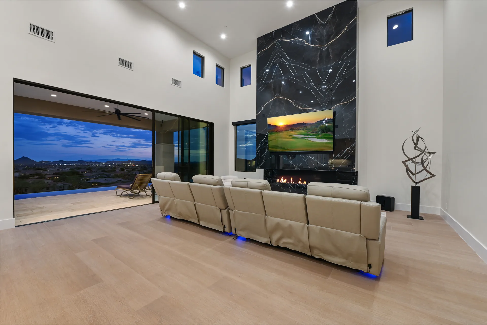 Praiano Way living room with city lights view