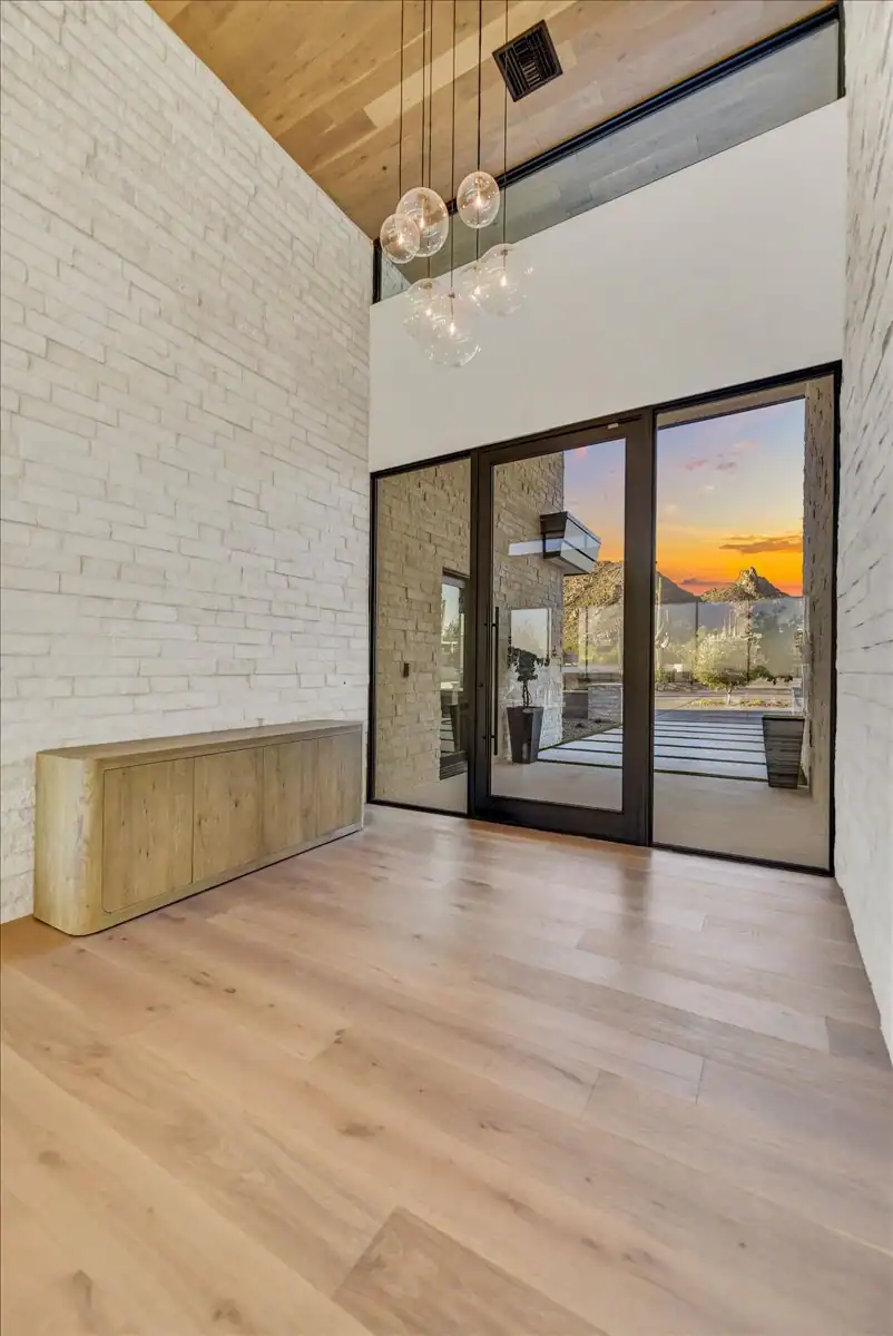 Two-story foyer with custom millwork