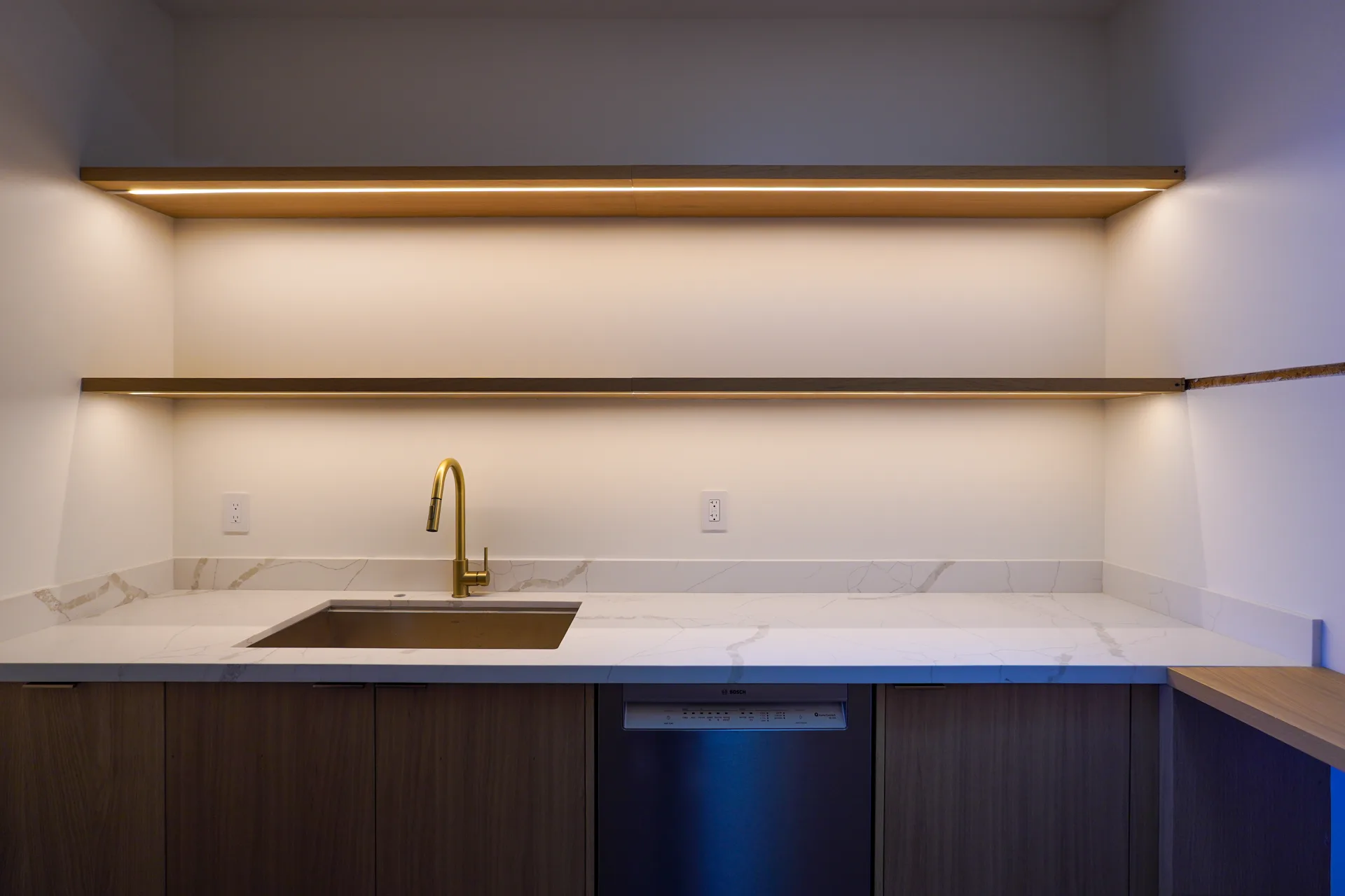 Butler's pantry floating shelves with integrated lighting
