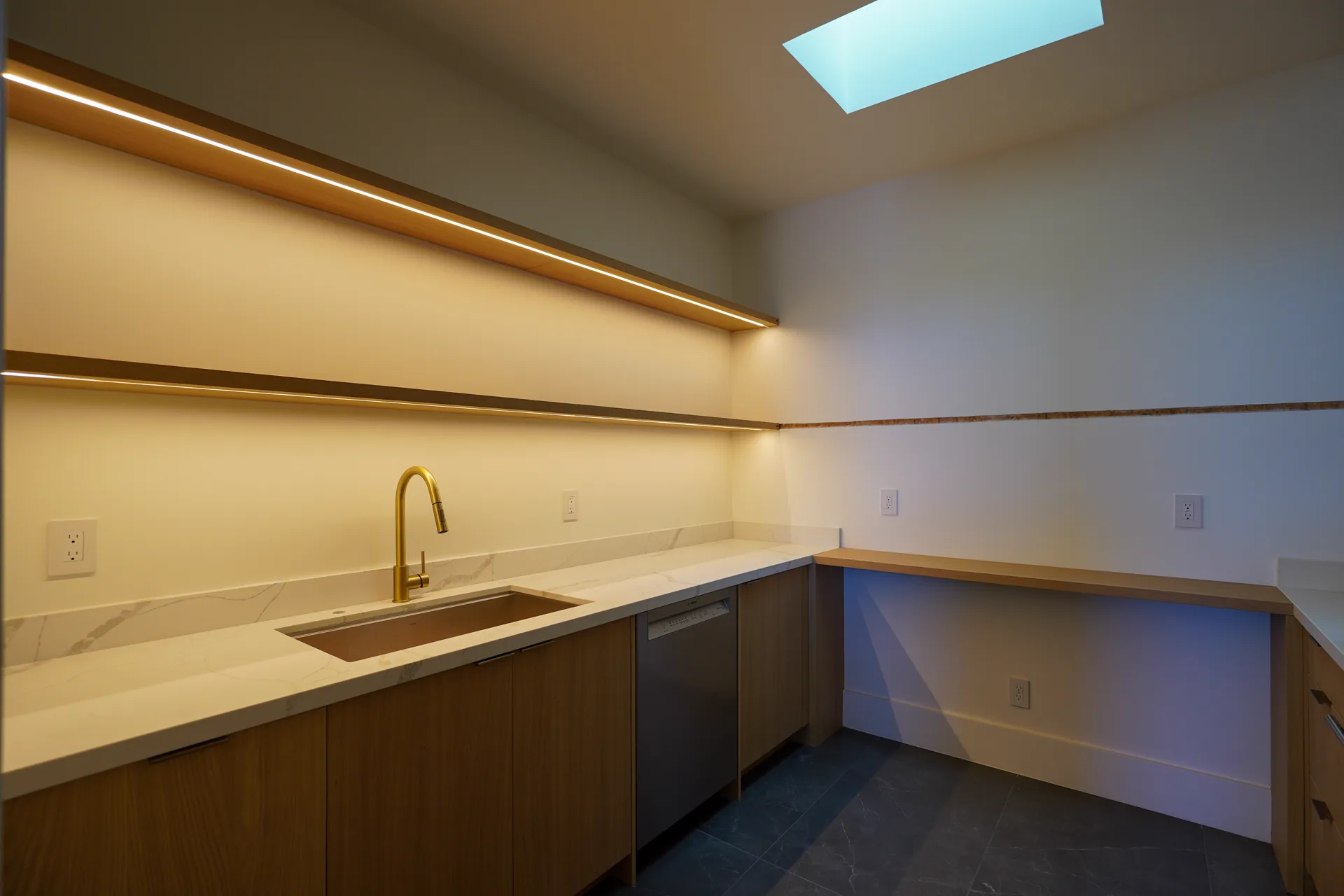 Butler's pantry sink with lit floating shelves