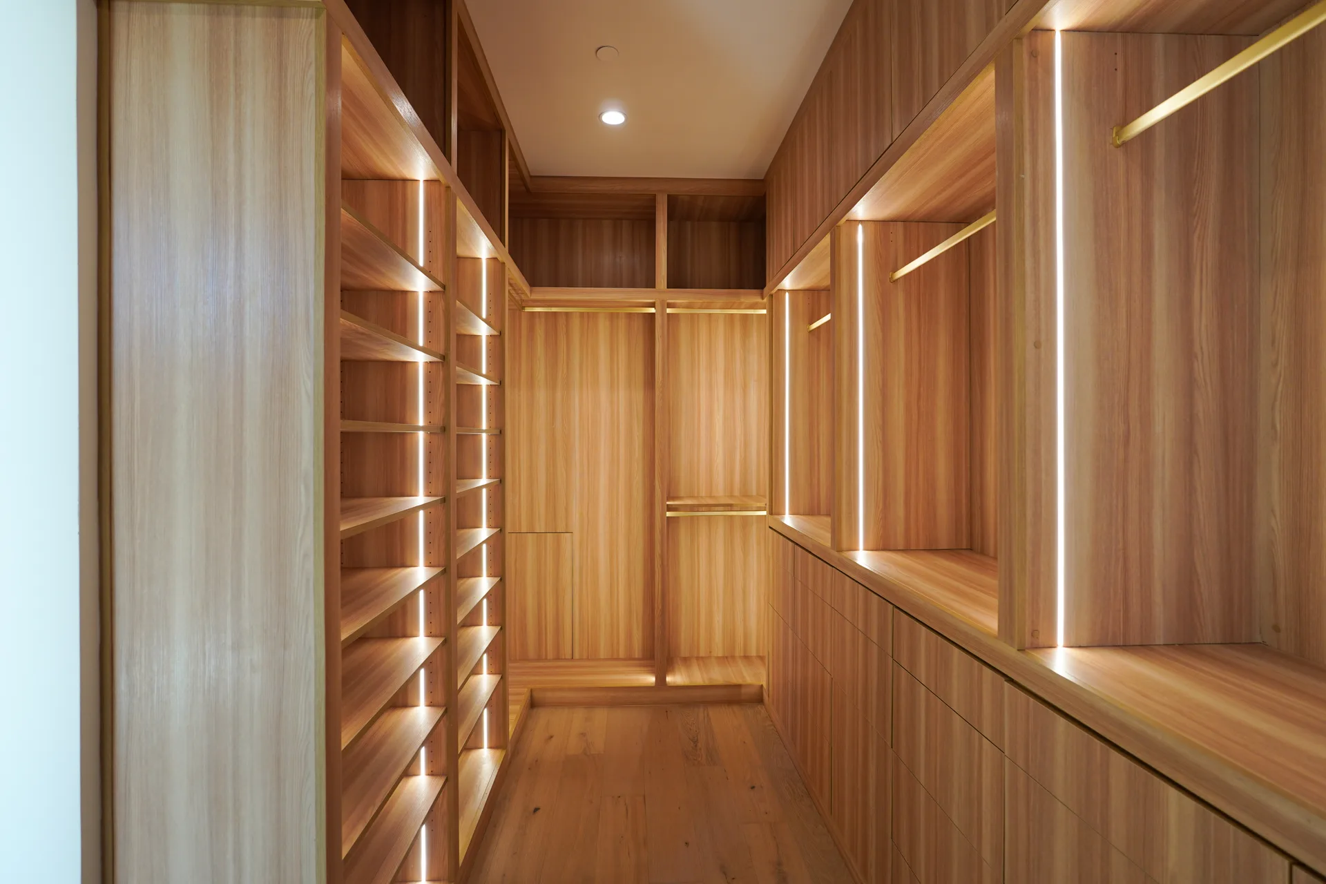 Integrated lighting in the primary closet millwork