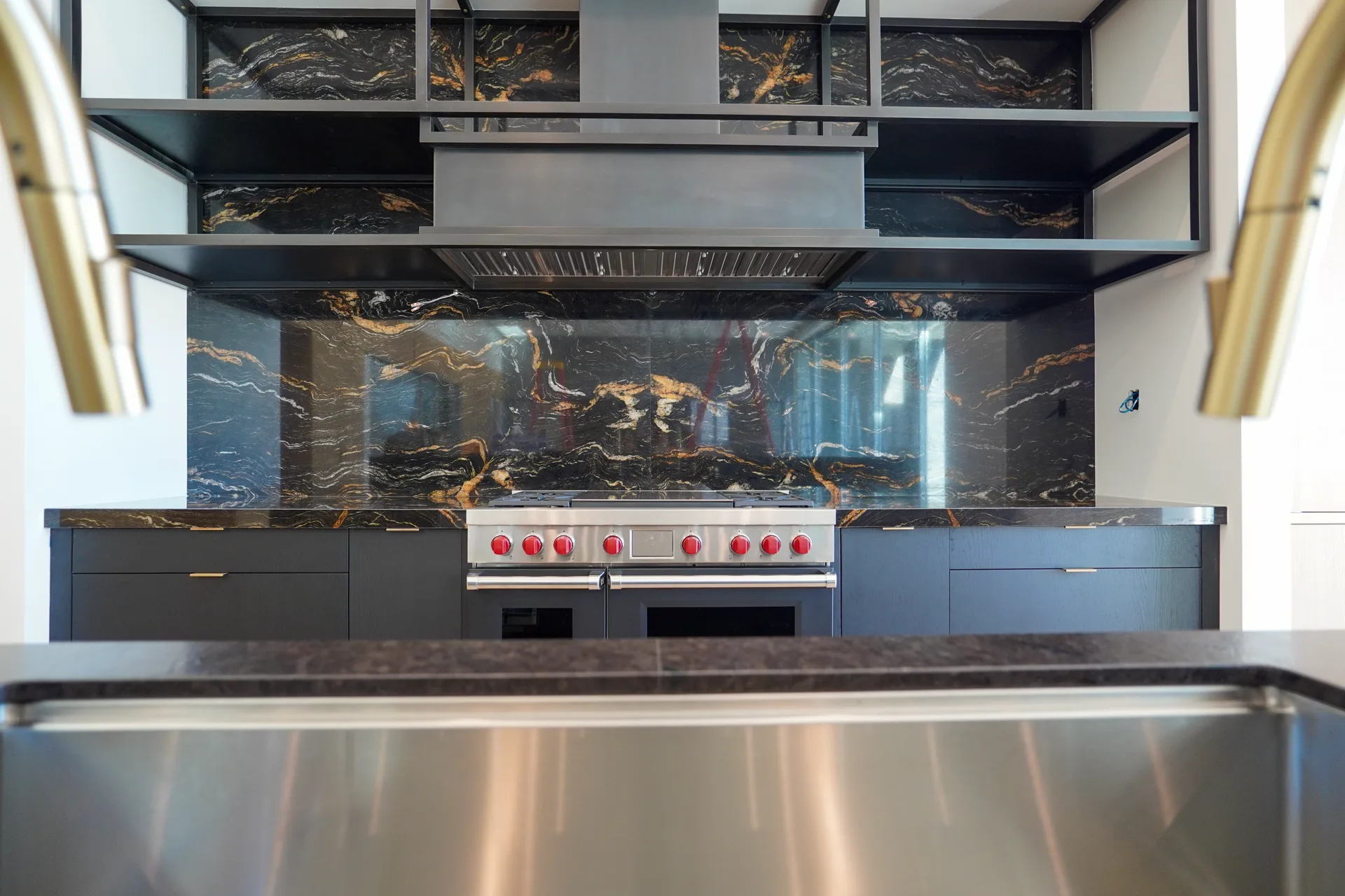 Range wall seen across the island sink